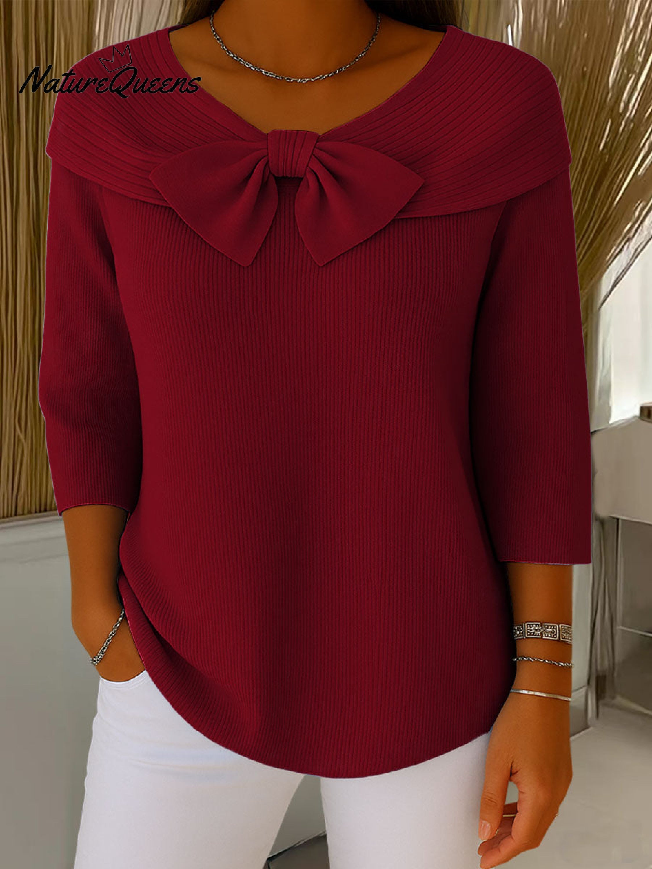 Jersey de punto informal de manga tres cuartos con cuello redondo y lazo, color liso, para mujer.