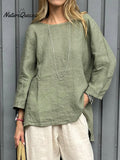 Camisa informal de mujer de algodón y lino con manga tres cuartos.