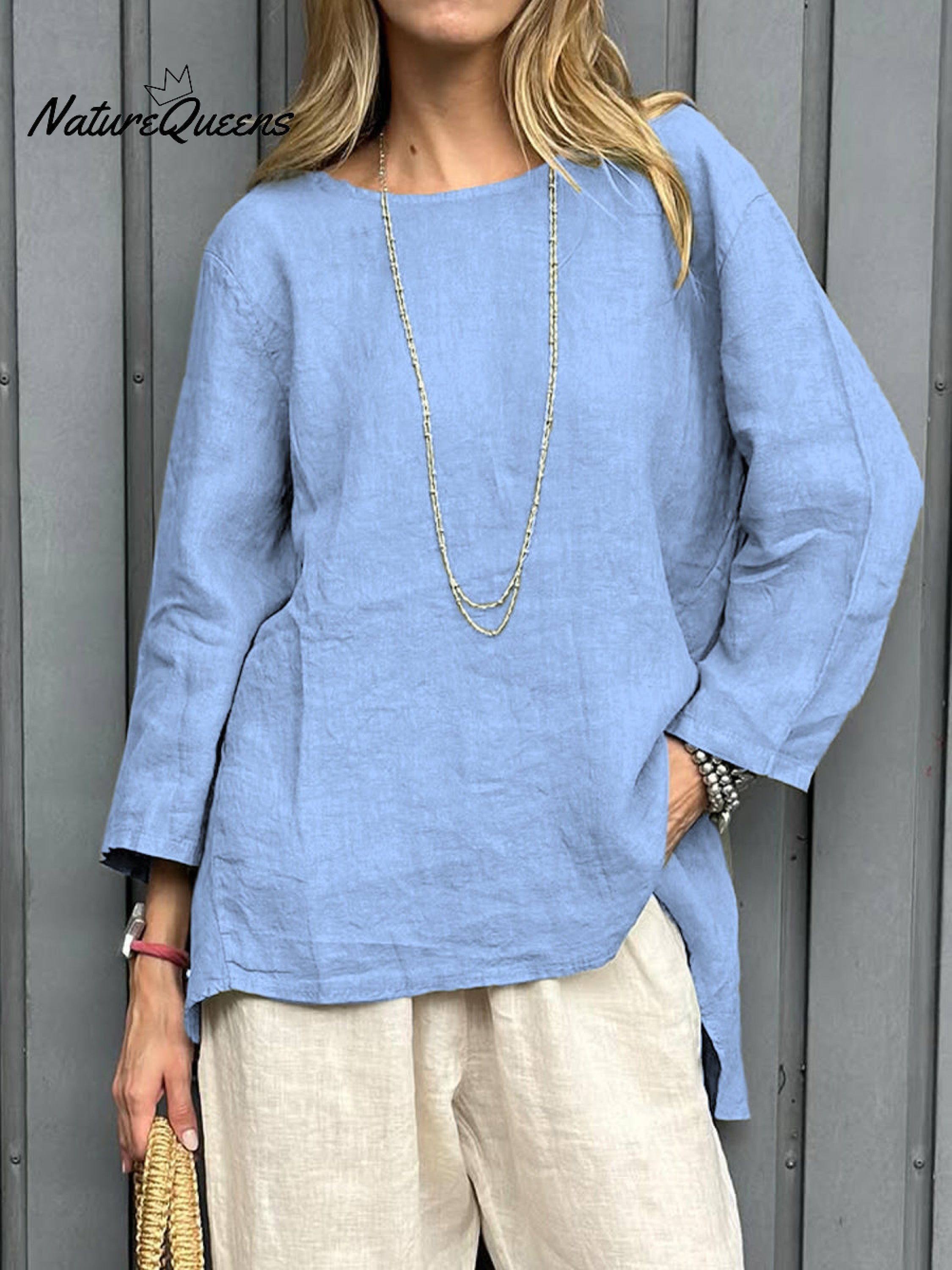 Camisa informal de mujer de algodón y lino con manga tres cuartos.