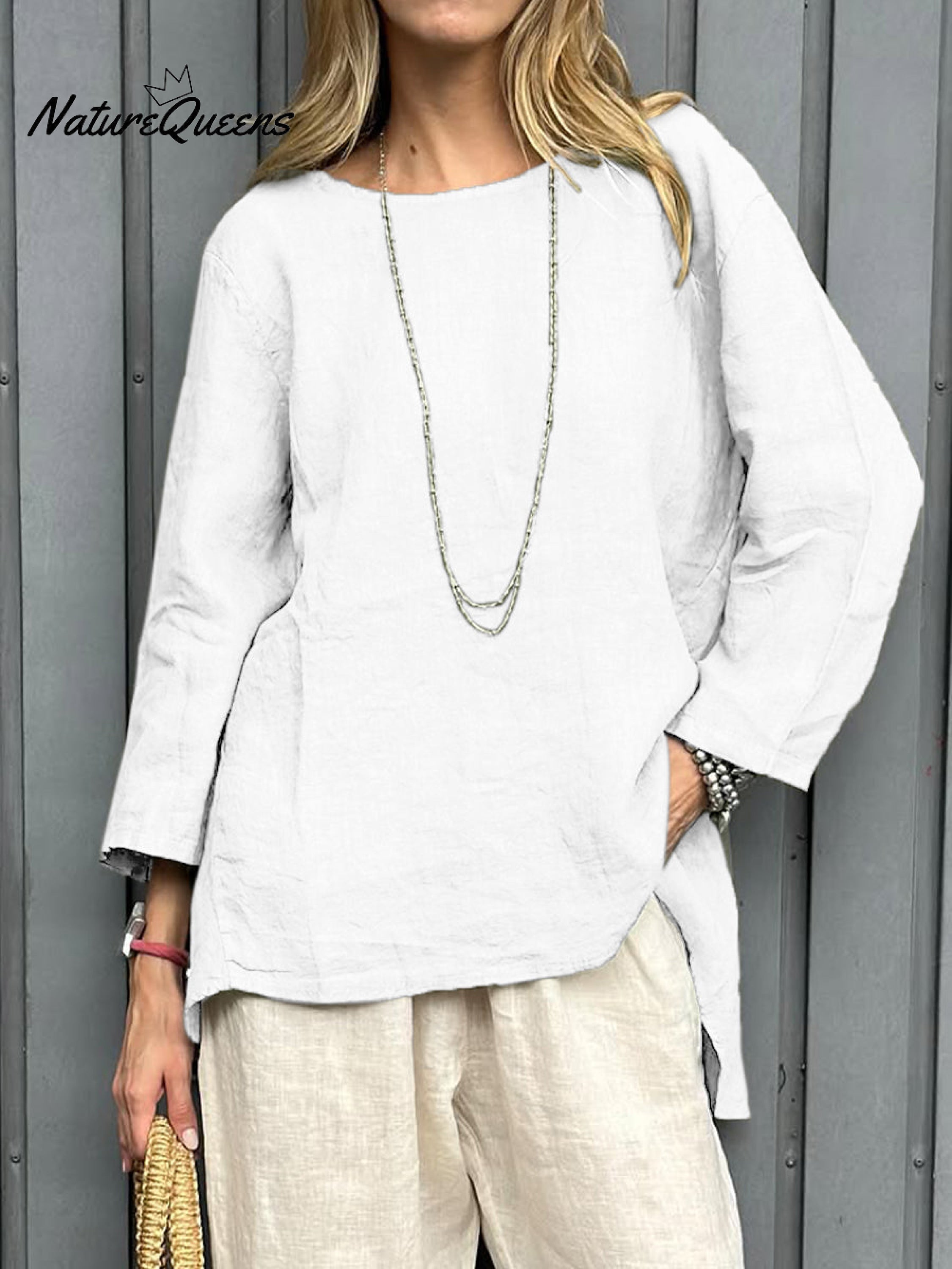 Camisa informal de mujer de algodón y lino con manga tres cuartos.