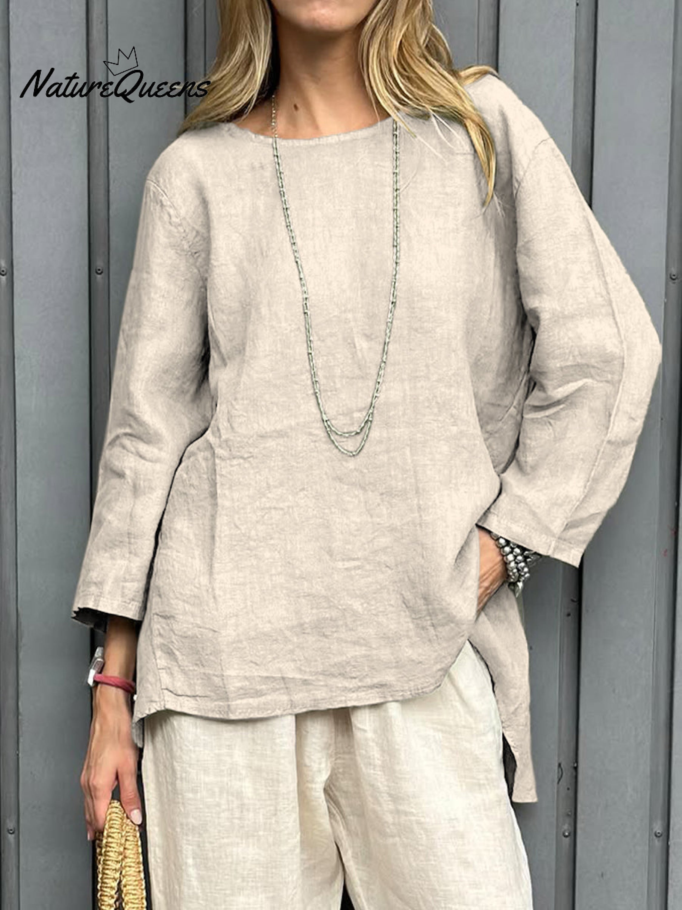 Camisa informal de mujer de algodón y lino con manga tres cuartos.