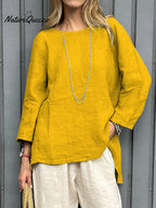Camisa informal de mujer de algodón y lino con manga tres cuartos.