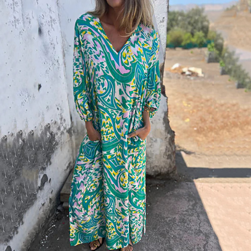 Lowri™ | Elegante vestido largo con cuello en V y bolsillos